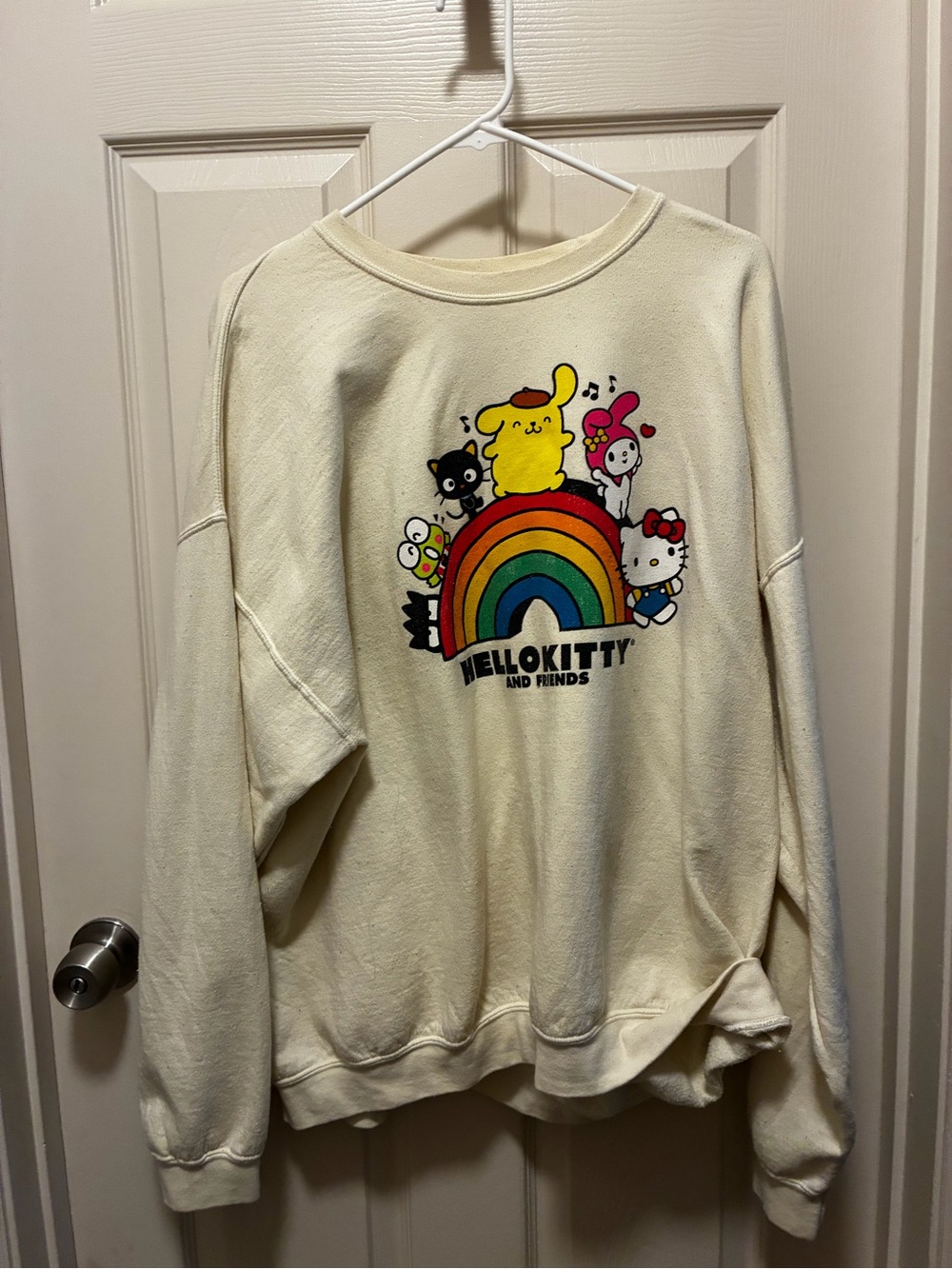 Hello Kitty Cream Sweatshirt with Multicolor Rainbow Graphic